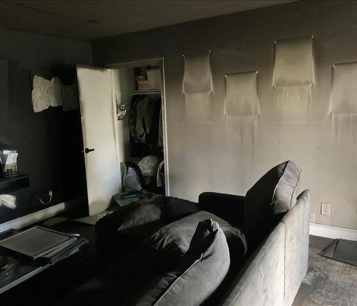 living room with soot on walls